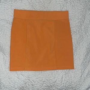 Orange mini skirt